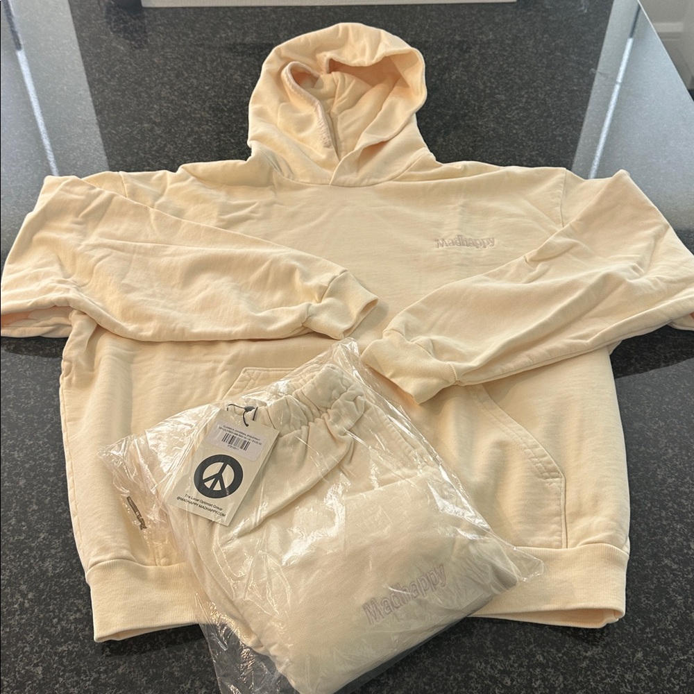 Madhappy sweat suit in butter yellow. NWT size Medium